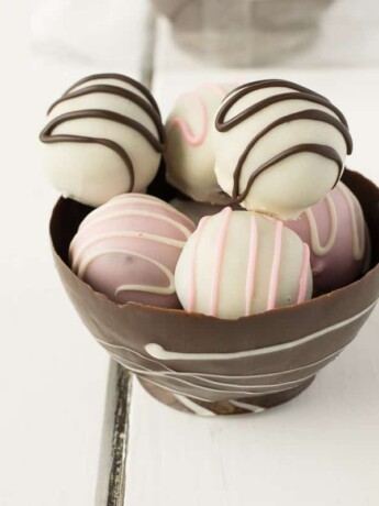 A closeup showing the truffles in the chocolate bowl