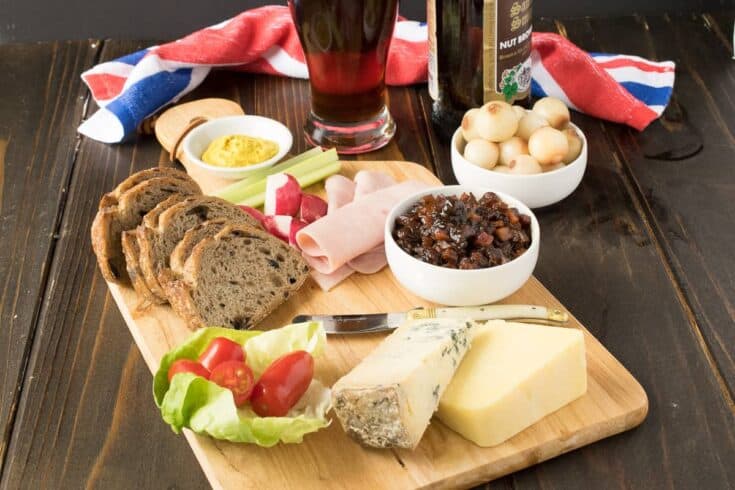 A very British and extremely popular pub lunch item, the Ploughman's lunch is a meal consisting of cold meats, cheese, bread, pickle and of course, beer. It's like a picnic on plate. This recipe, the fabled Ploughman's lunch, completes my British recipes week.