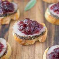 5 pork and cranberry crostini on a serving board