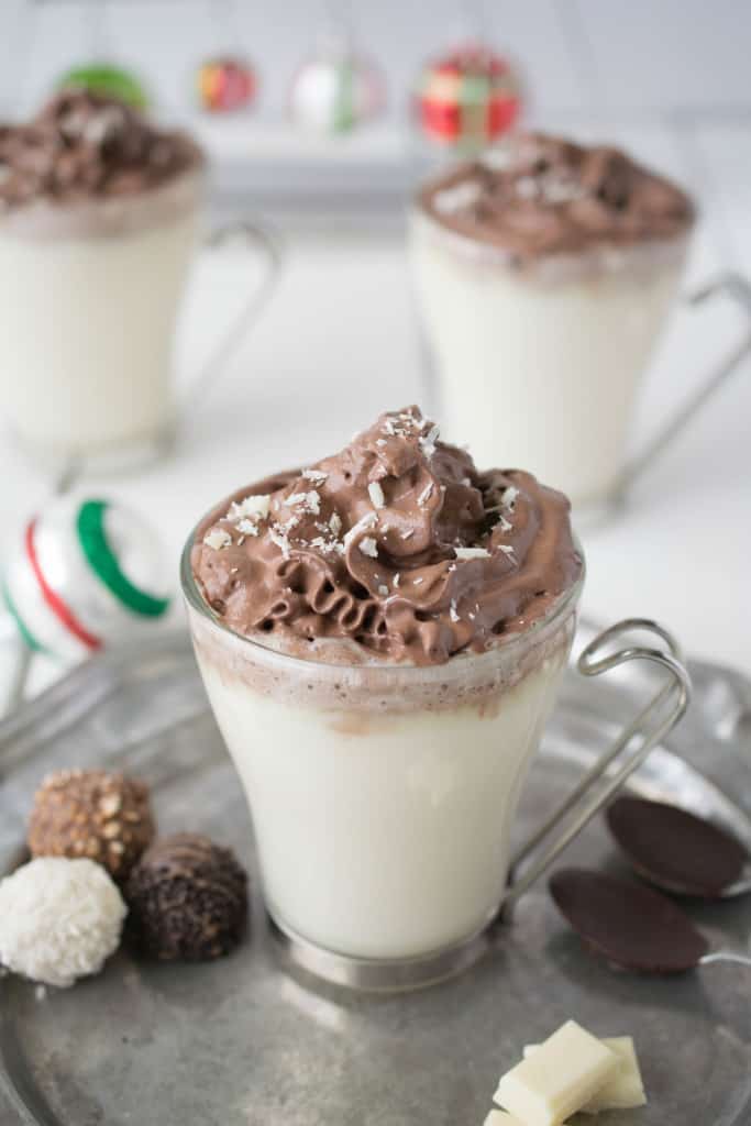 White hot chocolate with dark chocolate whipped cream. It's a chocolate-fest that is a warm and comforting drink and will satisfy all chocolate lovers.