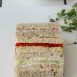 Ham, smoked salmon and cucumber tea sandwiches cut into rectangles