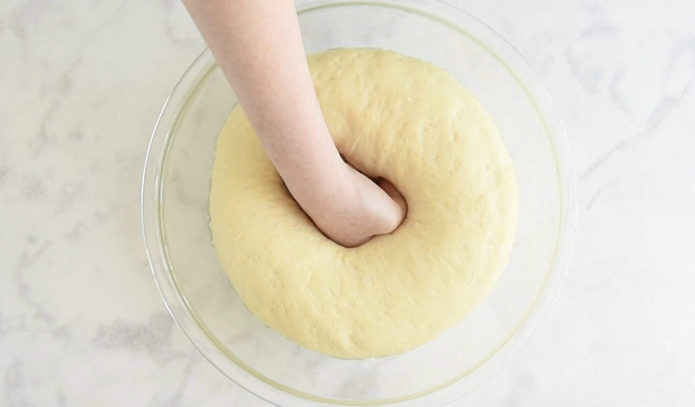 Punching bread dough