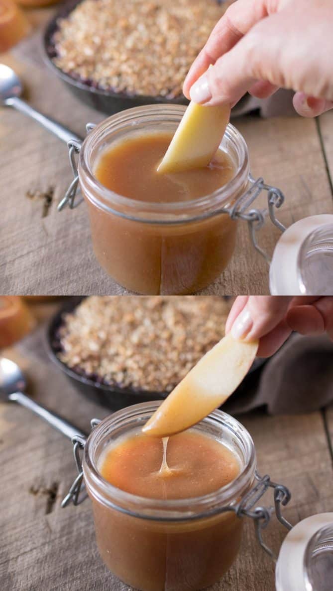 Dipping an apple slice into caramel sauce