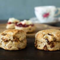Round apple and date scones on a board