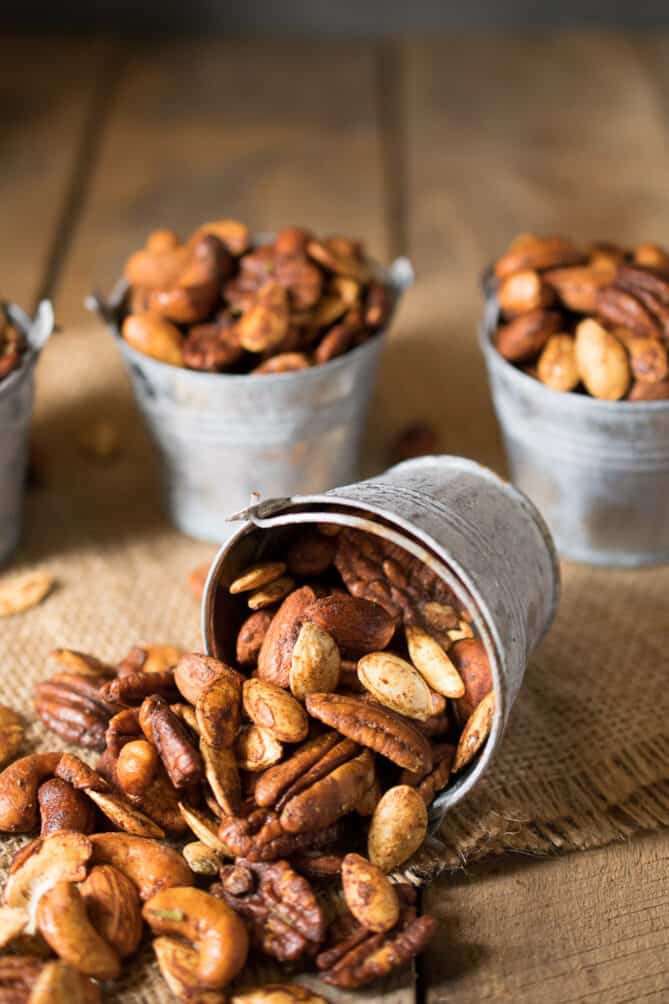 A closeup of roasted almonds, pecans, cashews and pumpkin seeds