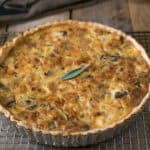A quiche on a wire rack