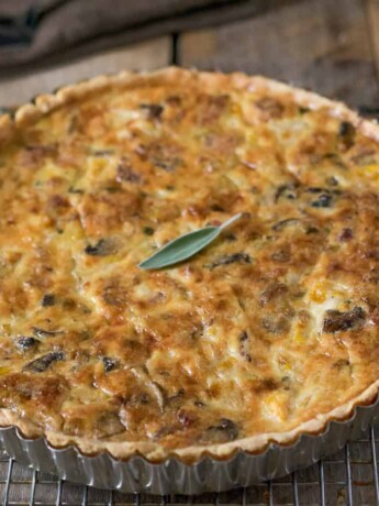 A quiche on a wire rack