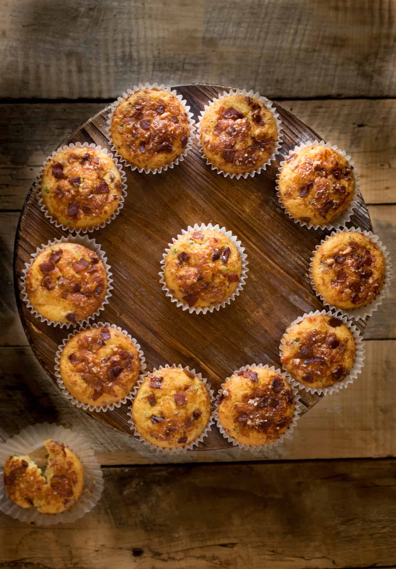 Bacon cheddar corn muffins displayed in a circle from overhead