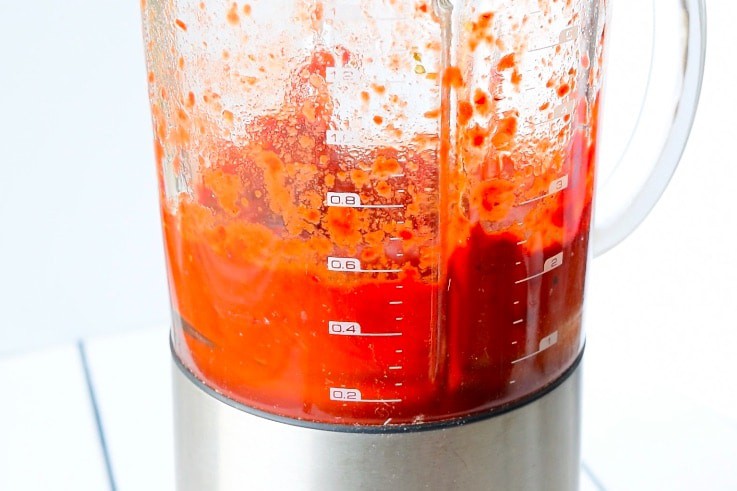 Guajillo peppers, garlic, cumin, oregano, salt and agave are blended into a sauce