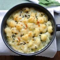 Bubbly with a brown top, cheese sauce with fresh sage and gnocchi
