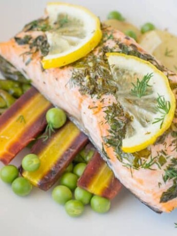 A closeup showing fresh lemon slices and dill