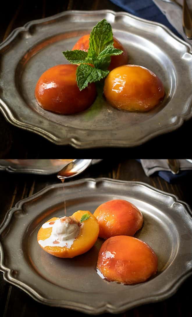 Poached peach halves on a plate with ice cream garnished with fresh mint