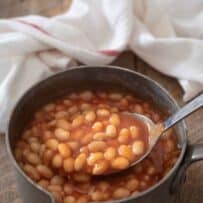 Baked beans on a large spoon