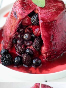 Fresh berries and juices inside of a bread pudding dome