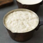 A small copper pan filled with bread sauce