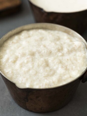 A small copper pan filled with bread sauce