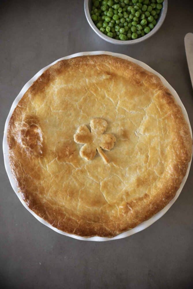 A corned beef pie from overhead with a shamrock