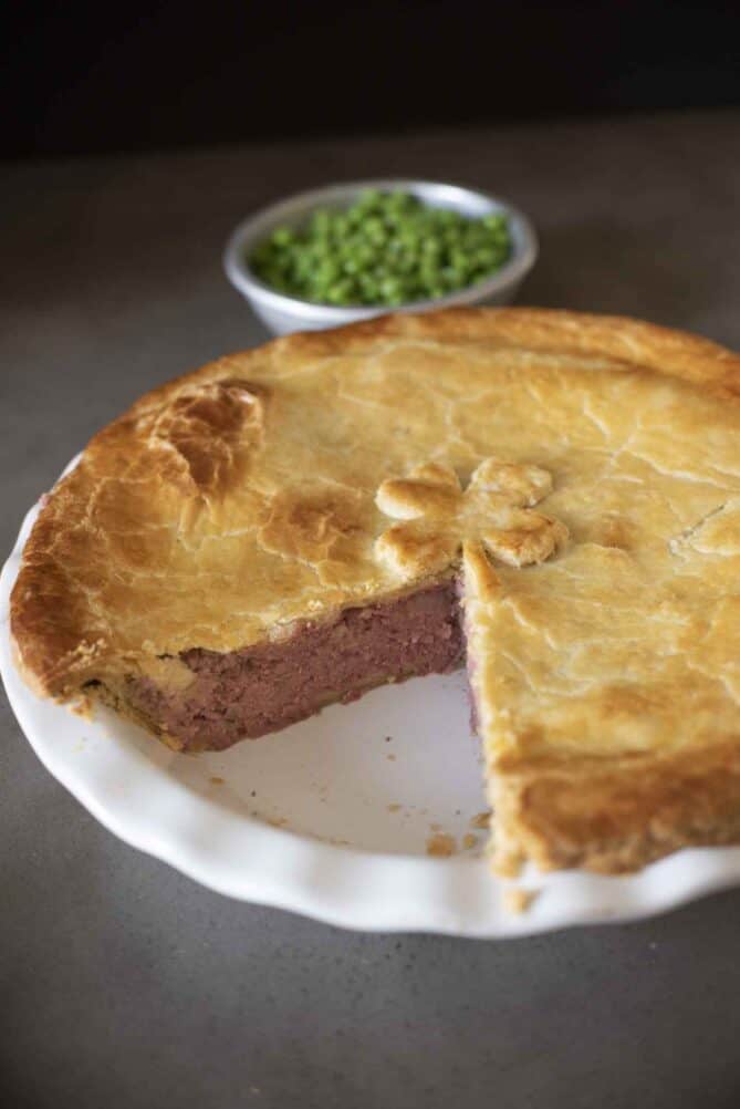 The inside of a corned beef and potato pie