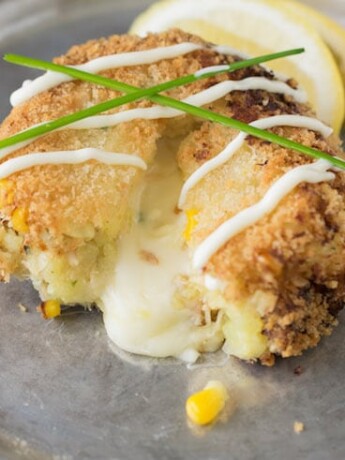 A cheesy tuna melt cake with a fork