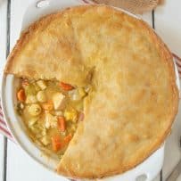 Perfectly browned pastry on a chicken pot pie with winter vegetables