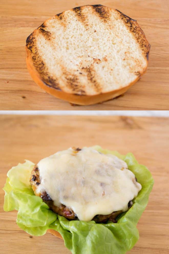 A grilled bun and a burger with melted cheese on lettuce