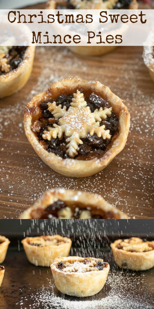 Sweet mince pies on a board dusted with powdered sugar
