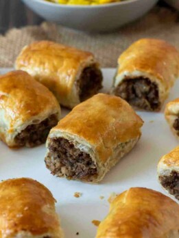 A closeup of mushroom and onion sausage rolls