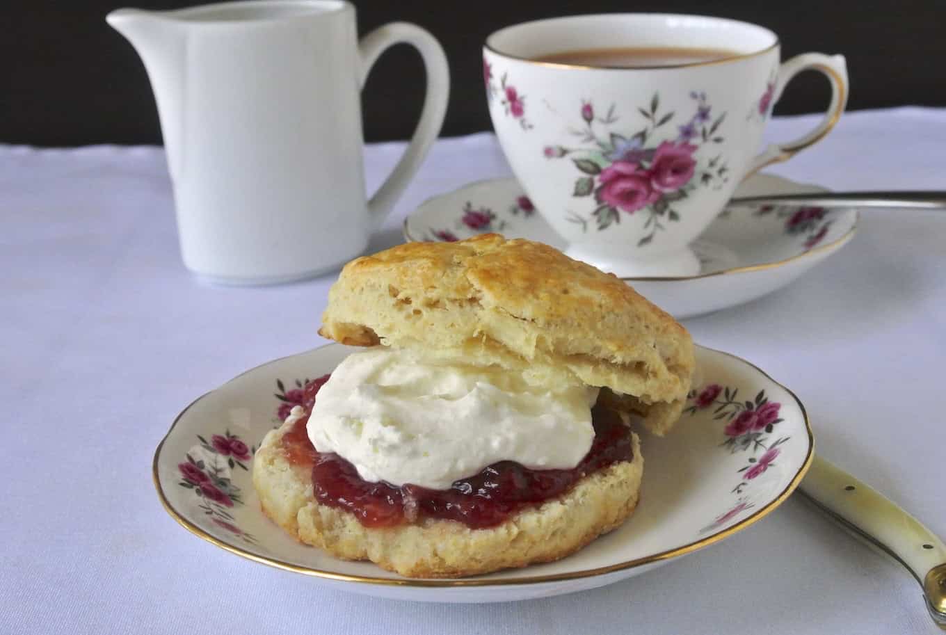 An English scone with clotted cream and jam