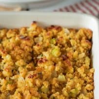 Cornbread stuffing with sage and onion in a roasting pan with a crispy browned top