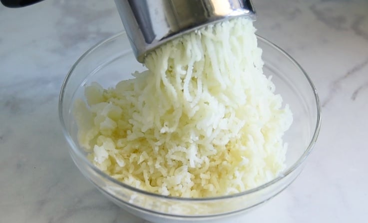 Mash or use a potato ricer to mash the potatoes