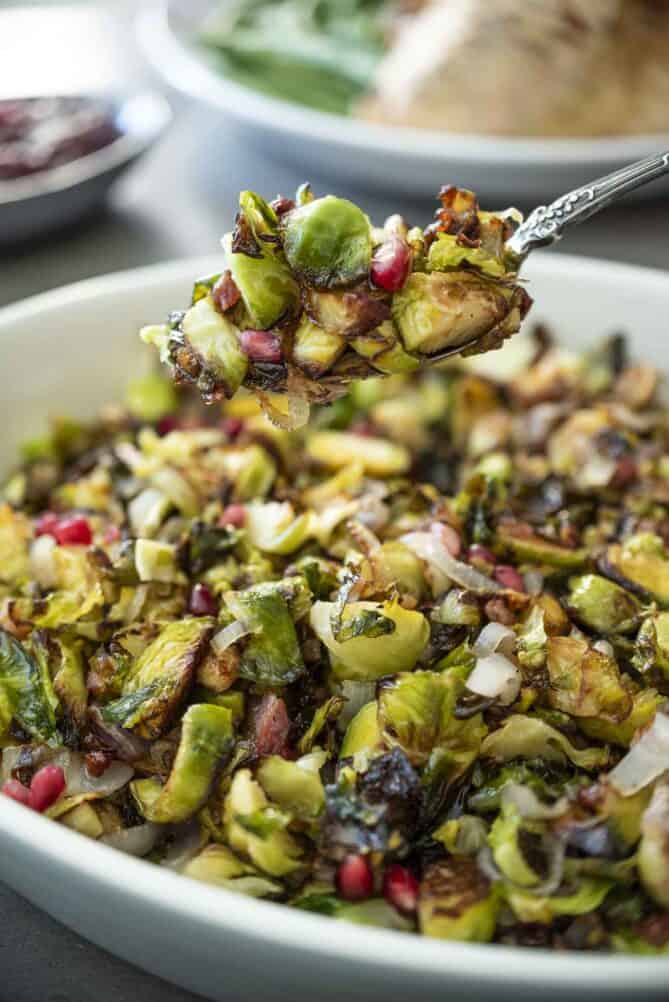 A large spoonful of crispy shredded Brussels sprouts with pancetta