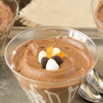 A martini shaped glass filled with dark chocolate espresso mousse