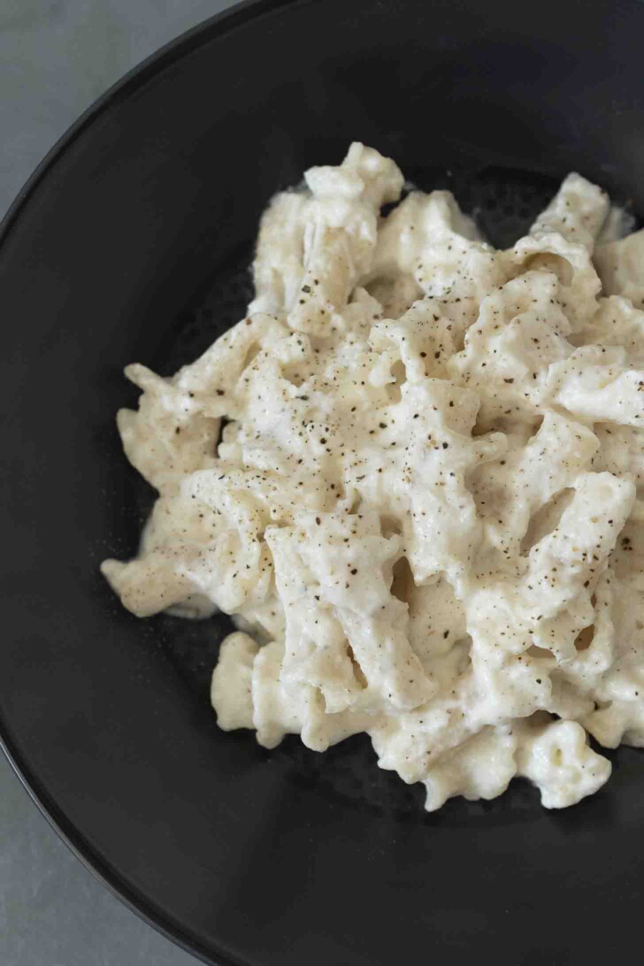 A closeup of ricotta and Pecorino pasta
