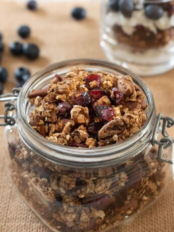 A closeup of granola with nuts and dried fruit