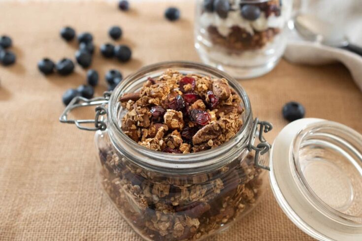 A closeup of granola with nuts and dried fruit