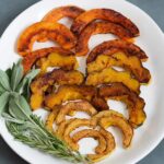 Butternut squash, acorn and delicata squash, sliced