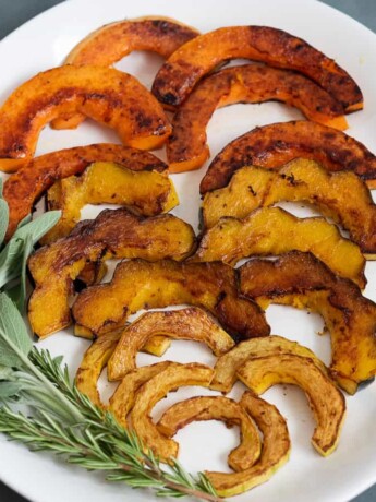 Butternut squash, acorn and delicata squash, sliced