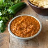 Red salsa in a grey bowl