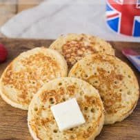 Toasted crumpets topped with butter