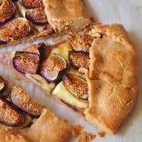 A triangle piece of fig and brie galette
