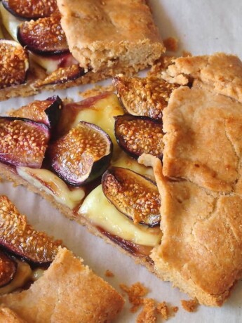 A triangle piece of fig and brie galette
