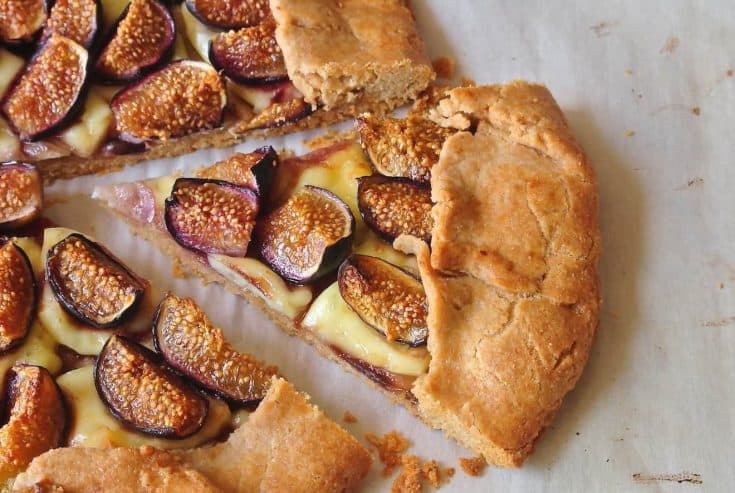 A triangle piece of fig and brie galette