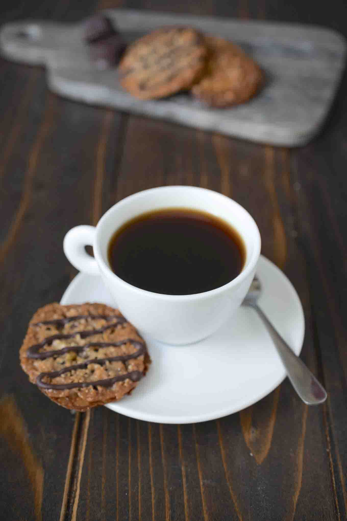 A Florentine cookie with a cup of coffee