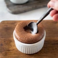 Using a spoon to dig into the soufflé