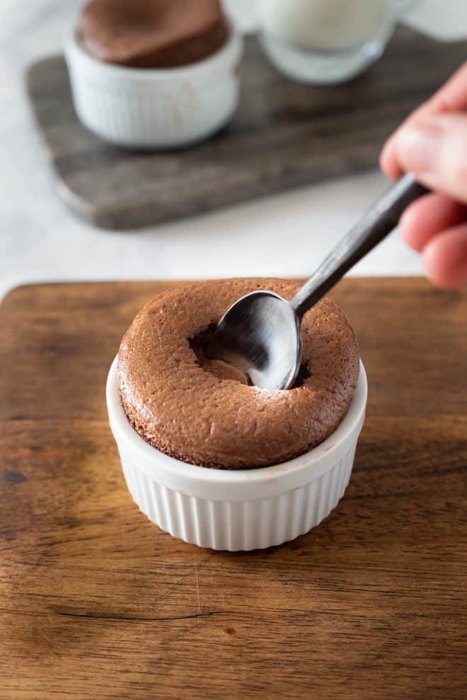 Using a spoon to dig into the soufflé