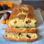 A lengthwise view of a sliced fig and orange bread