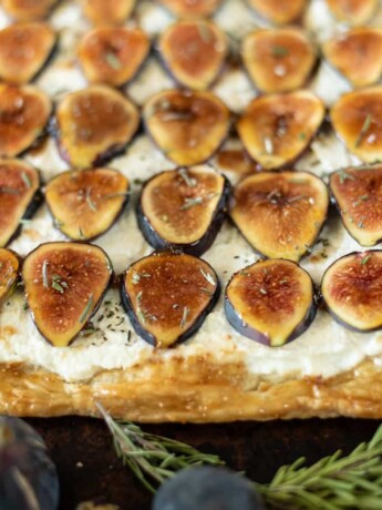 The uncut tart on a serving tray