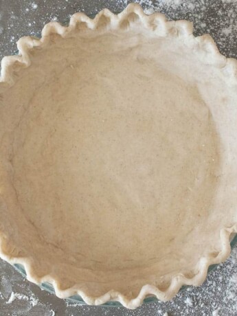 A gluten free pie crust ready for the oven