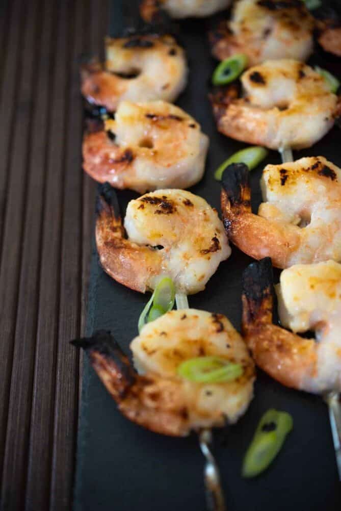 A closeup of perfectly grilled shrimp