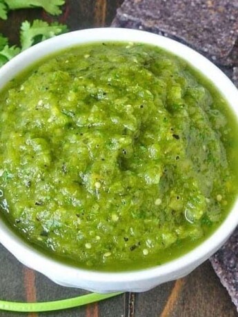 This grilled salsa verde is not your average salsa verde. Grilled tomatillos, pasilla peppers and jalapeño with added sweetness from pineapple. This  is a salsa so full of flavor you'll find it hard to put down the tortilla chips.